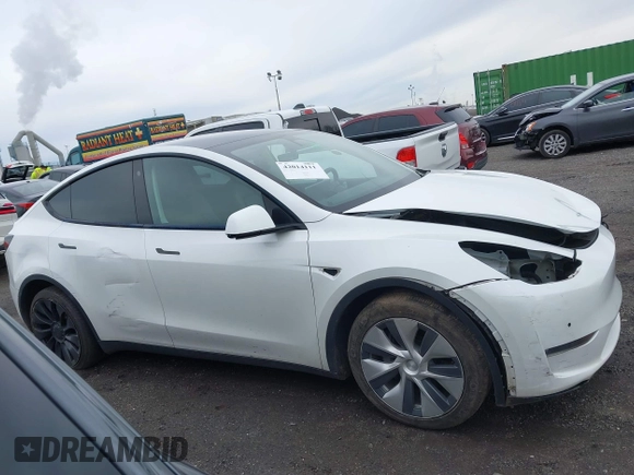 2022 Tesla Model Y Long Range z VIN 7SAYGDEE7NF389788, wystawiony jako IAAI lot #42014111 z przebiegiem 37 606 mil mil oraz . Historia ofert i sprzedaży dostępna na DreamBid. Obrazek 12.