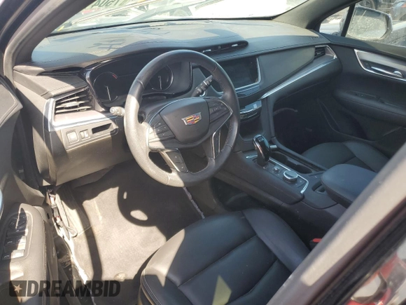 2022 Cadillac XT5 FWD Luxury z VIN 1GYKNAR4XNZ165234, wystawiony jako Copart lot #85392754 z przebiegiem 36 100 mil mil oraz Nie do naprawy • Non repairable. Historia ofert i sprzedaży dostępna na DreamBid. Obrazek 8.