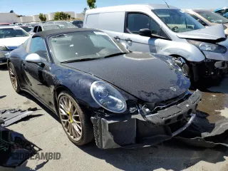 2019 Porsche 911 4S with VIN WP0BB2A99KS126019, listed as a Copart auction lot 60111334 with 25,012 mi miles and Salvage Title. Bid and sale history available at carsss.com. Image 4.