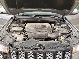 2020 Jeep Grand Cherokee Altitude z VIN 1C4RJFAG1LC374784, wystawiony jako Copart lot #48811295 z przebiegiem 185 345 mil mil oraz Szkoda całkowita • Salvage title. Historia ofert i sprzedaży dostępna na DreamBid. Obrazek 13.