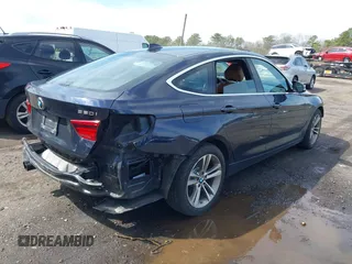 2018 BMW 3 Series 330i xDrive with VIN WBA8Z9C54JG828207, listed as a IAAI auction lot 42000931 with 73,736 mi miles. Bid and sale history available at carsss.com. Image 4.