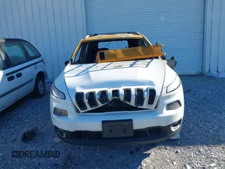 2014 Jeep Cherokee Altitude with VIN 1C4PJMCB5EW120946, listed as a IAAI auction lot 41348100 with Not Provided miles and . Bid and sale history available at DreamBid. Image 11.