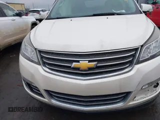 2014 Chevrolet Traverse LTZ z VIN 1GNKRJKDXEJ263349, wystawiony jako IAAI lot #41180521 z przebiegiem 141 564 mil mil oraz . Historia ofert i sprzedaży dostępna na DreamBid. Obrazek 11.