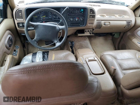 1995 GMC Suburban z VIN 1GKFK16K0SJ748087, wystawiony jako Copart lot #85121834 z przebiegiem 191 550 mil mil oraz Szkoda całkowita • Salvage title. Historia ofert i sprzedaży dostępna na DreamBid. Obrazek 8.