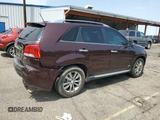 2013 Kia Sorento SX with VIN 5XYKWDA2XDG363999, listed as a Copart auction lot 58200985 with 69,056 mi miles and Salvage title. Bid and sale history available at DreamBid. Image 3.