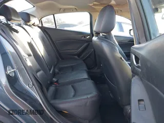 2014 Mazda 3 S Grand Touring with VIN JM1BM1W36E1112033, listed as a IAAI auction lot 41412655 with 115,050 mi miles and . Bid and sale history available at DreamBid. Image 8.