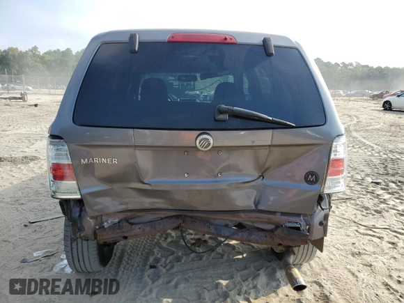 2009 Mercury Mariner with VIN 4M2CU81G69KJ18657, listed as a Copart auction lot 68869154 with 186,290 mi miles and Salvage title. Bid and sale history available at DreamBid. Image 6.