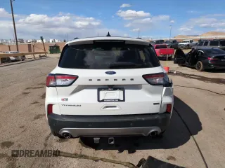 2021 Ford Escape Titanium Hybrid z VIN 1FMCU0DZ2MUB02954, wystawiony jako Copart lot #50558285 z przebiegiem 25 612 mil mil oraz Szkoda całkowita • Salvage title. Historia ofert i sprzedaży dostępna na DreamBid. Obrazek 14.