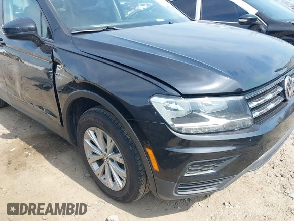 2020 Volkswagen Tiguan S with VIN 3VV1B7AX1LM086019, listed as a IAAI auction lot 42458434 with 114,413 mi miles and . Bid and sale history available at DreamBid. Image 19.
