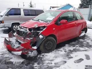 2008 Toyota Yaris with VIN JTDJT923285159575, listed as a IAAI auction lot 41559257 with 206,466 mi miles. Bid and sale history available at carsss.com. Image 2.
