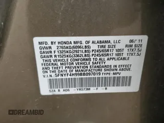 2011 Honda Pilot Touring with VIN 5FNYF4H99BB097019, listed as a Copart auction lot 53865365 with 260,357 mi miles and Salvage Title. Bid and sale history available at DreamBid. Image 13.