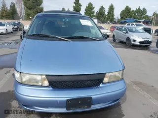 1997 Nissan Quest XE with VIN 4N2DN1117VD801599, listed as a IAAI auction lot 41558507 with 205,064 mi miles. Bid and sale history available at carsss.com. Image 6.