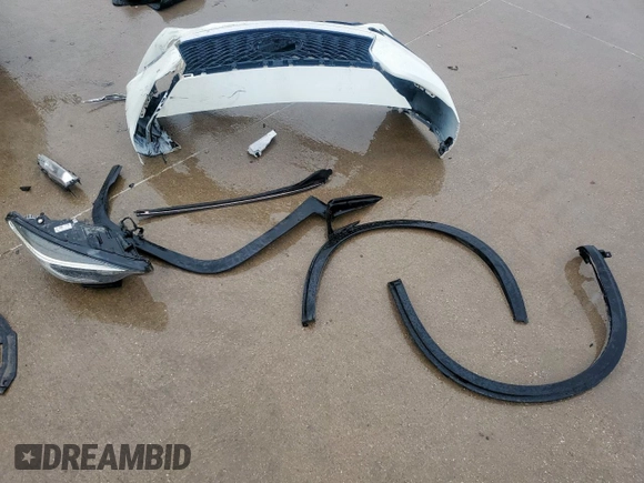 2018 Infiniti QX30 Premium with VIN SJKCH5CP2JA056283, listed as a Copart auction lot 60574585 with 102,573 mi miles and Salvage title. Bid and sale history available at DreamBid. Image 13.