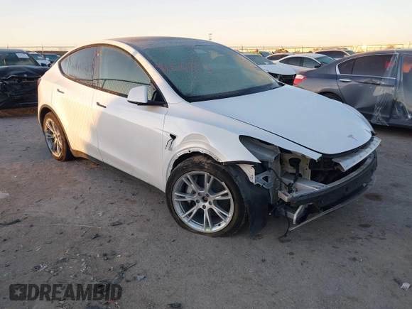 2023 Tesla Model Y Long Range z VIN 7SAYGDEE6PA061228, wystawiony jako IAAI lot #41371547 z przebiegiem 25 121 mil mil oraz . Historia ofert i sprzedaży dostępna na DreamBid. Obrazek 1.