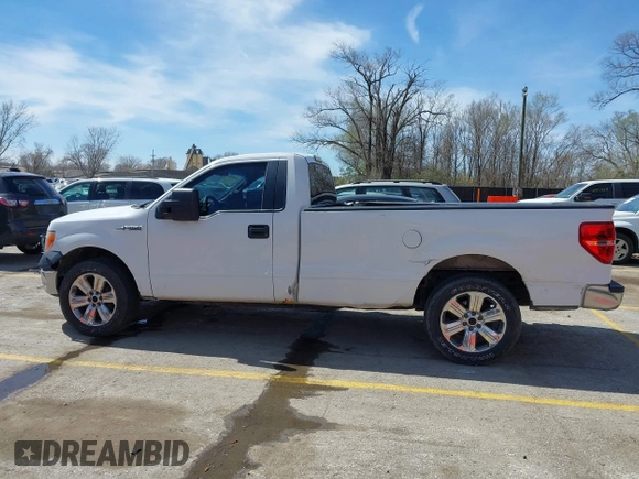 2014 Ford F-150 XL with VIN 1FTMF1CM1EKD53945, listed as a IAAI auction lot 41889789 with 296,163 mi miles and . Bid and sale history available at DreamBid. Image 14.