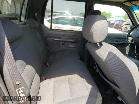2001 Ford Explorer Sport Trac z VIN 1FMZU77E81UA92437, wystawiony jako Copart lot #57461165 z przebiegiem 275 633 mil mil oraz Czysty tytuł • Clean title. Historia ofert i sprzedaży dostępna na DreamBid. Obrazek 11.