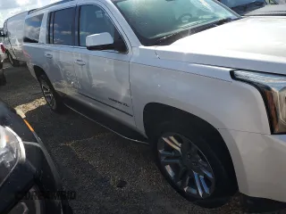 2020 GMC Yukon XL SLT with VIN 1GKS1GKC0LR160258, listed as a Copart auction lot 76796114 with 0 mi miles and Salvage Title. Bid and sale history available at carsss.com. Image 4.
