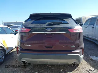 2019 Ford Edge Titanium z VIN 2FMPK3K94KBB41673, wystawiony jako IAAI lot #41762692 z przebiegiem 82 812 mil mil oraz . Historia ofert i sprzedaży dostępna na DreamBid. Obrazek 16.