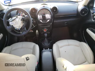 2015 MINI Countryman S with VIN WMWZC5C57FWP48606, listed as a Copart auction lot 47212255 with 104,922 mi miles and Salvage Title. Bid and sale history available at DreamBid. Image 8.