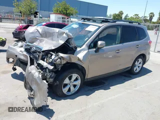 2014 Subaru Forester Touring with VIN JF2SJAPC3EH558690, listed as a IAAI auction lot 42588000 with 151,065 mi miles and . Bid and sale history available at DreamBid. Image 2.