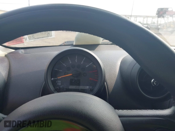 2015 MINI Countryman S with VIN WMWZC5C59FWM18935, listed as a IAAI auction lot 42427878 with 121,410 mi miles and . Bid and sale history available at DreamBid. Image 7.