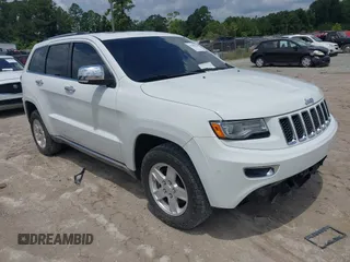 2015 Jeep Grand Cherokee z VIN 1C4RJEJM8FC674648, wystawiony jako IAAI lot #42785823 z przebiegiem 207 084 mil mil oraz . Historia ofert i sprzedaży dostępna na DreamBid. Obrazek 1.