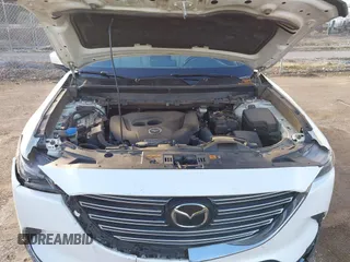 2016 Mazda CX-9 Grand Touring z VIN JM3TCADY4G0124588, wystawiony jako IAAI lot #41192549 z przebiegiem 161 272 mil mil oraz . Historia ofert i sprzedaży dostępna na DreamBid. Obrazek 10.