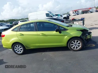 2011 Ford Fiesta SE z VIN 3FADP4BJ3BM181711, wystawiony jako IAAI lot #42492104 z przebiegiem 102 667 mil mil oraz . Historia ofert i sprzedaży dostępna na DreamBid. Obrazek 14.