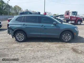 2019 Volkswagen Tiguan S with VIN 3VV1B7AX2KM131063, listed as a IAAI auction lot 41937501 with 59,402 mi miles. Bid and sale history available at carsss.com. Image 14.