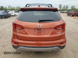 2017 Hyundai Santa Fe 2.4L z VIN 5XYZUDLB6HG411375, wystawiony jako Copart lot #50551165 z przebiegiem 35 597 mil mil oraz Czysty tytuł • Clean title. Historia ofert i sprzedaży dostępna na DreamBid. Obrazek 6.