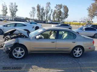 2002 Infiniti I35 Luxury with VIN JNKDA31A52T027346, listed as a IAAI auction lot 41709863 with 227,266 mi miles. Bid and sale history available at carsss.com. Image 14.