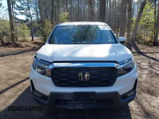 2023 Honda Passport EX-L z VIN 5FNYF8H56PB037470, wystawiony jako IAAI lot #41330084 z przebiegiem Nie podano mil oraz . Historia ofert i sprzedaży dostępna na DreamBid. Obrazek 11.