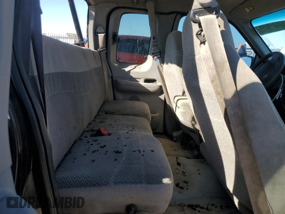 1999 Ford F-150 с VIN 2FTZX1729XCA25031, выставлен на аукционе Copart как лот 46941615 с пробегом 310 800 миль миль и Списание • Salvage title. История ставок и продаж доступна на DreamBid. Изображение 10.