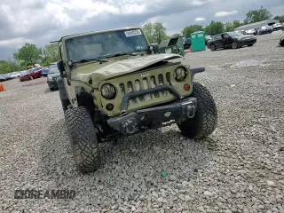 2013 Jeep Wrangler Unlimited Sport z VIN 1C4BJWDG3DL678908, wystawiony jako Copart lot #54840255 z przebiegiem 94 618 mil mil oraz Szkoda całkowita • Salvage title. Historia ofert i sprzedaży dostępna na DreamBid. Obrazek 13.