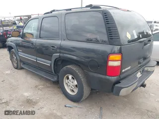 2003 Chevrolet Tahoe LT with VIN 1GNEC13Z93R296379, listed as a IAAI auction lot 41574575 with 301,567 mi miles. Bid and sale history available at carsss.com. Image 3.