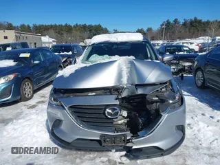 2016 Mazda CX-9 Sport with VIN JM3TCBBYXG0117878, listed as a IAAI auction lot 41617757 with 114,231 mi miles. Bid and sale history available at carsss.com. Image 12.