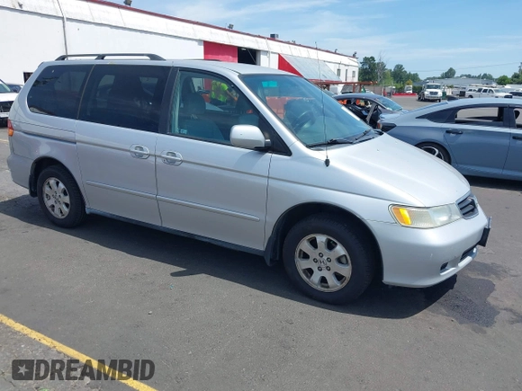2003 Honda Odyssey EX-L with VIN 5FNRL18993B098670, listed as a IAAI auction lot 42781006 with 222,584 mi miles and . Bid and sale history available at DreamBid. Image 1.