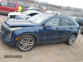 2020 Cadillac XT4 AWD Sport with VIN 1GYFZFR48LF101467, listed as a IAAI auction lot 41113381 with 72,841 mi miles and . Bid and sale history available at DreamBid. Image 14.