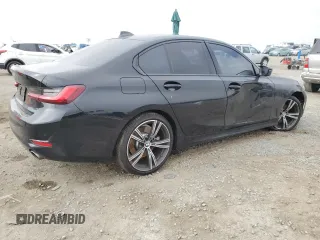 2022 BMW 3 Series 330i with VIN 3MW5R1J06N8C45380, listed as a Copart auction lot 50214105 with 49,995 mi miles and Salvage Title. Bid and sale history available at carsss.com. Image 3.