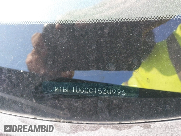 2012 Mazda 3 i Sport z VIN JM1BL1UG0C1530996, wystawiony jako IAAI lot #41987191 z przebiegiem 174 144 mil mil oraz . Historia ofert i sprzedaży dostępna na DreamBid. Obrazek 9.
