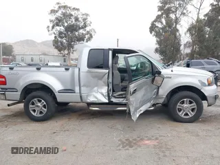 2005 Ford F-150 XLT z VIN 1FTPX04595KC18420, wystawiony jako IAAI lot #41493863 z przebiegiem 181 395 mil mil oraz . Historia ofert i sprzedaży dostępna na DreamBid. Obrazek 13.