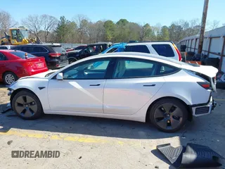 2022 Tesla Model 3 with VIN 5YJ3E1EA7NF103513, listed as a IAAI auction lot 41643592 with 35,631 mi miles and . Bid and sale history available at DreamBid. Image 14.