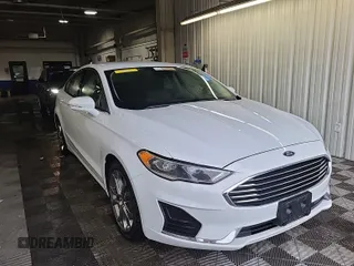 2020 Ford Fusion SEL with VIN 3FA6P0CD1LR154201, listed as a IAAI auction lot 42715761 with 99,448 mi miles and . Bid and sale history available at DreamBid. Image 34.