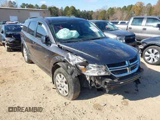 2018 Dodge Journey SE with VIN 3C4PDCABXJT183318, listed as a IAAI auction lot 40985444 with 164,051 mi miles. Bid and sale history available at carsss.com. Image 1.