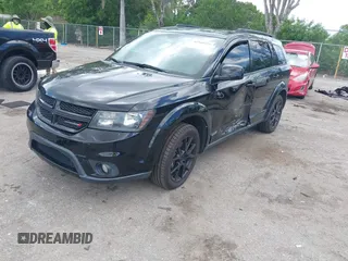 2016 Dodge Journey R/T with VIN 3C4PDCEG0GT226398, listed as a IAAI auction lot 42560255 with 127,498 mi miles and . Bid and sale history available at DreamBid. Image 2.