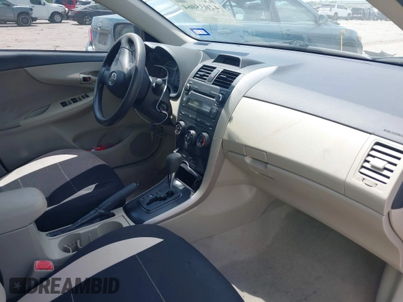 2013 Toyota Corolla L with VIN 5YFBU4EE9DP170801, listed as a IAAI auction lot 42035064 with 138,147 mi miles. Bid and sale history available at carsss.com. Image 5.