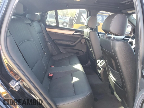 2018 BMW X4 M40i with VIN 5UXXW7C54J0Z44932, listed as a Copart auction lot 55973605 with 101,479 mi miles and Salvage title. Bid and sale history available at DreamBid. Image 11.