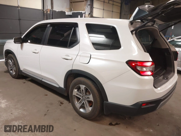 2023 Honda Pilot EX-L z VIN 5FNYG1H5XPB043275, wystawiony jako IAAI lot #41747522 z przebiegiem 18 865 mil mil oraz . Historia ofert i sprzedaży dostępna na DreamBid. Obrazek 3.