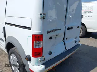 2013 Ford Transit Connect XLT z VIN NM0LS7BN1DT142402, wystawiony jako IAAI lot #42704844 z przebiegiem 127 148 mil mil oraz . Historia ofert i sprzedaży dostępna na DreamBid. Obrazek 12.
