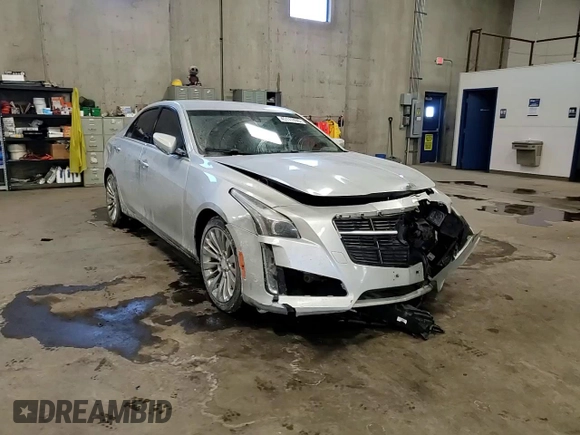 2014 Cadillac CTS AWD z VIN 1G6AW5SX9E0176985, wystawiony jako Copart lot #45111495 z przebiegiem 50 050 mil mil oraz Szkoda całkowita • Salvage title. Historia ofert i sprzedaży dostępna na DreamBid. Obrazek 11.